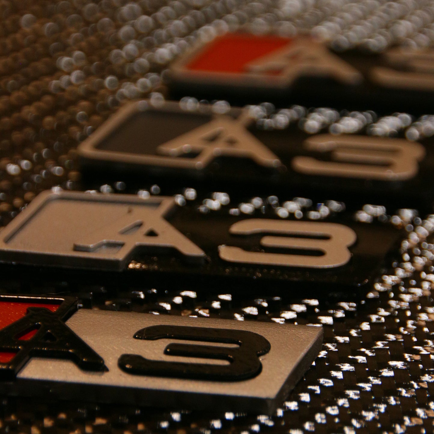 Close-up of a brand logo on a textured surface