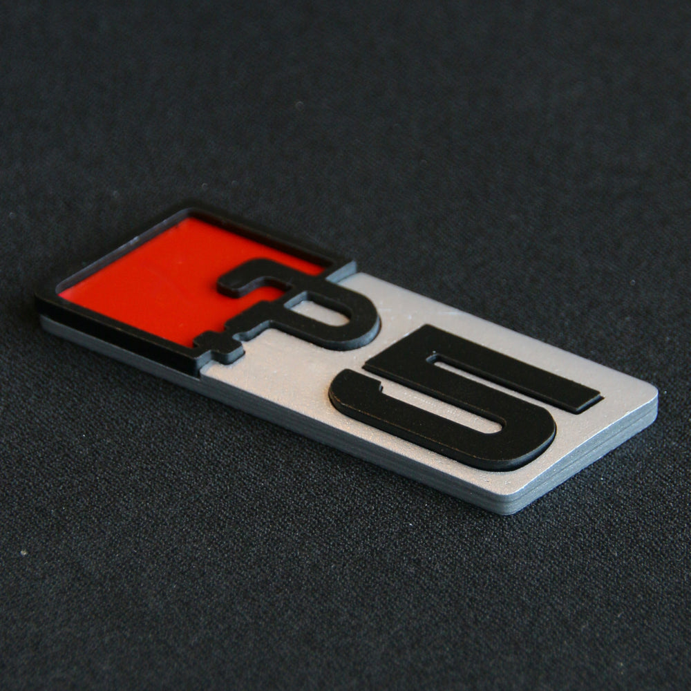 Audi A5 badge upgrade by CHIMERA STUDIO, featuring a sleek chrome emblem for car exterior decoration.