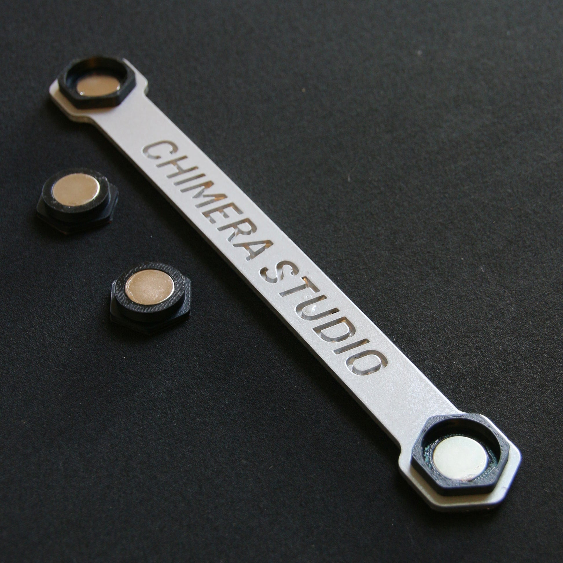CHIMERA STUDIO V1 Magnetic License Plate Bracket mounted on vehicle for easy installation and secure fit.