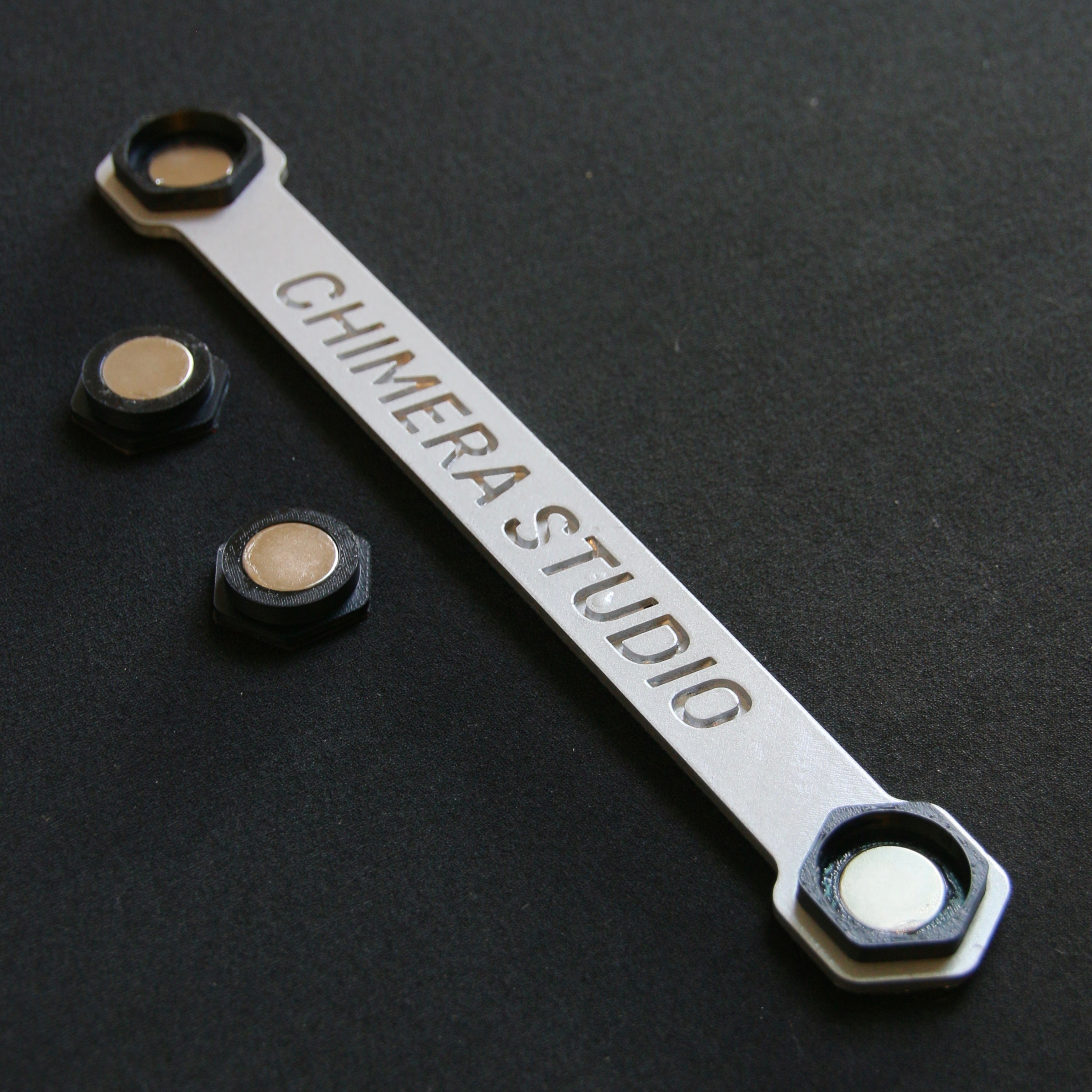 CHIMERA STUDIO V1 Magnetic License Plate Bracket mounted on vehicle for easy installation and secure fit.